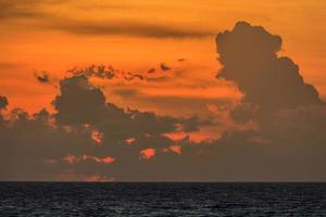 Impressive sunset on Phuket island in Thailand photo