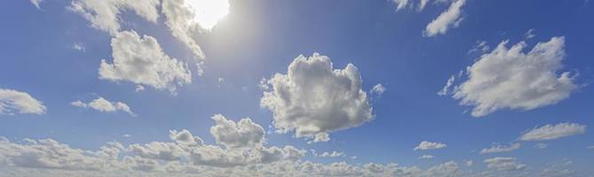 Image of a partly cloudy and partly clear sky during the day photo