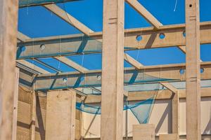 Construction site with precast concrete columns, beams and walls photo