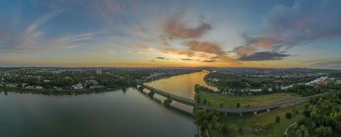 Panoramic aerial picture of Mainspitze area with Main river mouth and city of Mainz during sunset photo