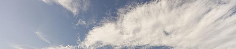 Image of a partly cloudy and partly clear sky during the day photo