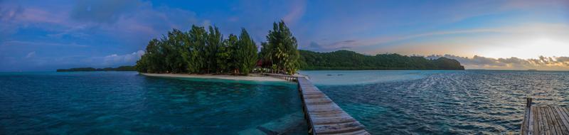 Pier of Carp Island in Palau at evening time in twlilight photo