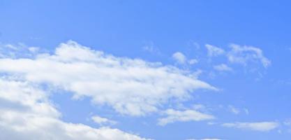 Image of a partly cloudy and partly clear sky during the day photo