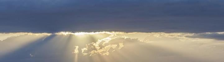 Dramatic colorful sky with afterglow and illuminated clouds photo