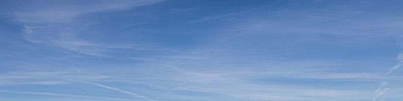 Image of a partly cloudy and partly clear sky during the day photo