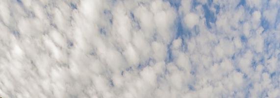 Image of a partly cloudy and partly clear sky during the day photo