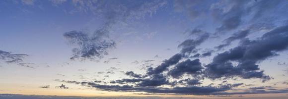 Dramatic colorful sky with afterglow and illuminated clouds photo