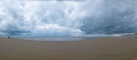 Panorama over North Sea beach of Middlekerke in Belgium during stormy weather photo