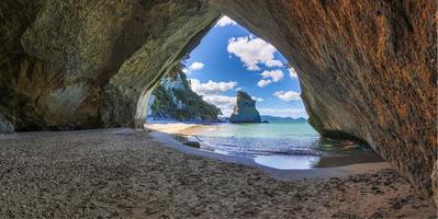View on Hoho Rock from inside Cathedral Cove on northern island of New Zealand wirhout people in summer photo