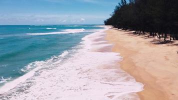 Aerial video concept o background for summer. Waves sea with beautiful beaches of Phuket, Thailand.