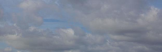 Image of a partly cloudy and partly clear sky during the day photo