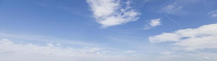 Image of a partly cloudy and partly clear sky during the day photo