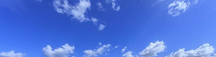 Image of a partly cloudy and partly clear sky during the day photo