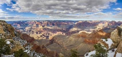 View to the Grand Canyon from the South Rim Reflection of a forest in a lake during the day in autumnwith beautiful cloud formations photo