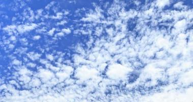 Image of a partly cloudy and partly clear sky during the day photo