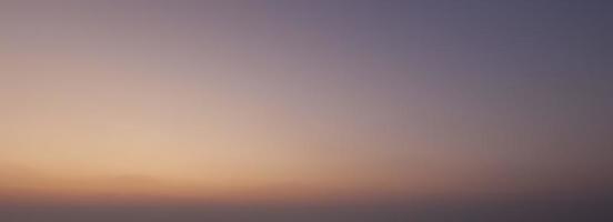 Dramatic colorful sky with afterglow and illuminated clouds photo