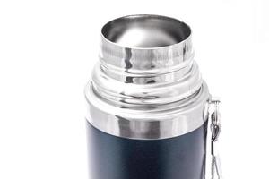 open neck of a dark blue thermos on a white background photo