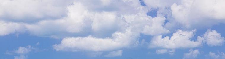 Image of a partly cloudy and partly clear sky during the day photo