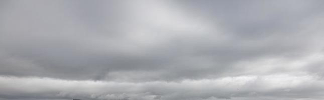 Image of a dark and cloudy sky during the day photo