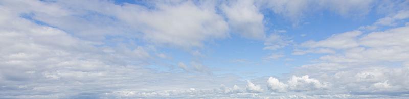 Image of a partly cloudy and partly clear sky during the day photo