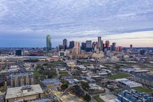 Panoramic picture of the Dallas skyline in morning sun and cloudy sky photo