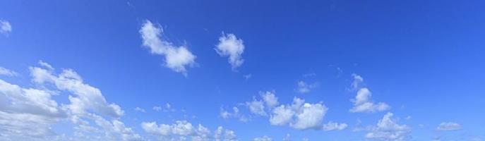 Image of a partly cloudy and partly clear sky during the day photo