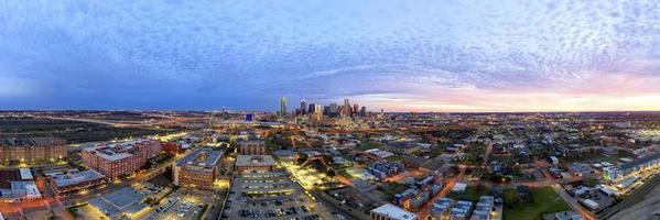 Panoramic picture of the Dallas skyline in morning sun and cloudy sky photo