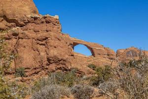 View on Skyline Arch in the Arches National Park in Utah in winter photo