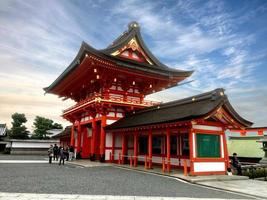 KYOTO, JAPAN, 2017 - The large temple gate is the first place visitors come to visit the beauty of the Fushimi Inari Shrine. photo