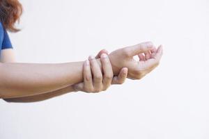 Asian female hands have weakness from office work photo