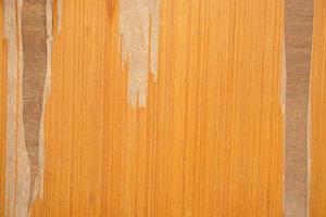 el viejo piso de madera tiene un patrón de deterioro. foto