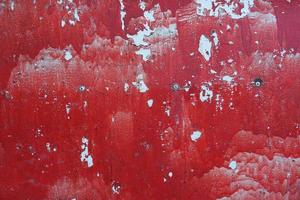 Old rusty red iron background. Peeling paint. photo