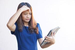 Businesswoman looking at laptop computer screen desperately losing business photo