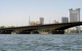 bridge over the river Nile and high houses in Cairo photo