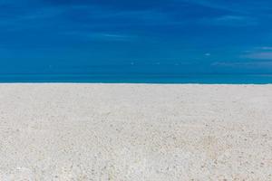 Empty sea and beach background with copy space. Sea view from tropical beach with sunny sky and beautiful sand. Tropical travel banner, blue coast, tourism and vacation banner photo