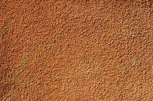 texture wall with orange plaster photo