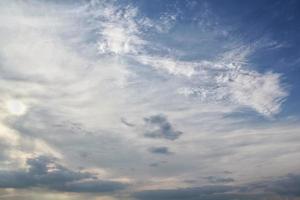 White light soft clouds floating in blue sky. Nature morning landscape background. Clear spring wind. Bright summer day. Winter calm air skyscape. Abstract panorama. Change climate. Low angle view photo