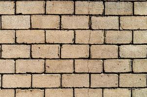 texture of a wall of concrete blocks with a crack photo