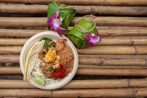 Street Food In Thailand, Pad Thai or Thai stir-fried noodles photo