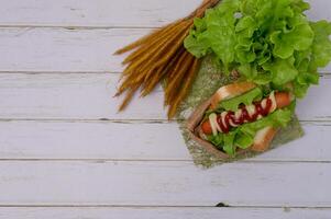 Food menu Sausage wrapped in bread photo