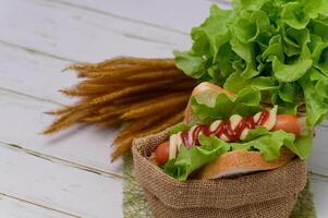 Food menu Sausage wrapped in bread photo