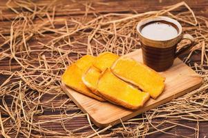 Buttered Bread with warm cow's milk photo