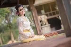 Beautiful Thai girl in Thai traditional costume photo