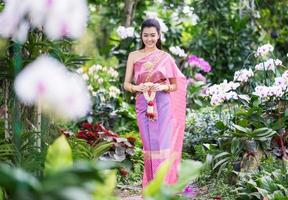 Beautiful Thai girl in Thai traditional costume photo