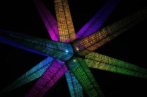 abstract decoration with colored lights in the dark photo