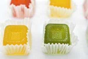 Delicious colorful pieces of marmalade. Marmalade on a white background. Beautiful marmalade. Fruit marmalade. photo