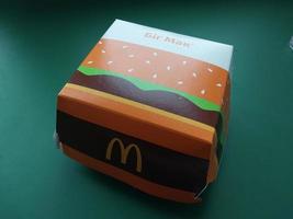 KYIV, UKRAINE - JANUARY 15, 2023 Food from McDonald's Big Mac with potatoes photo