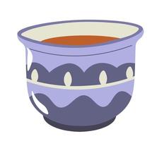 Tea in cup with geometric or oriental motif vector