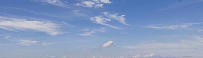 Image of a partly cloudy and partly clear sky during the day photo