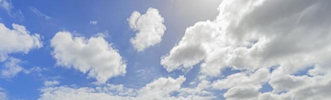 Image of a partly cloudy and partly clear sky during the day photo